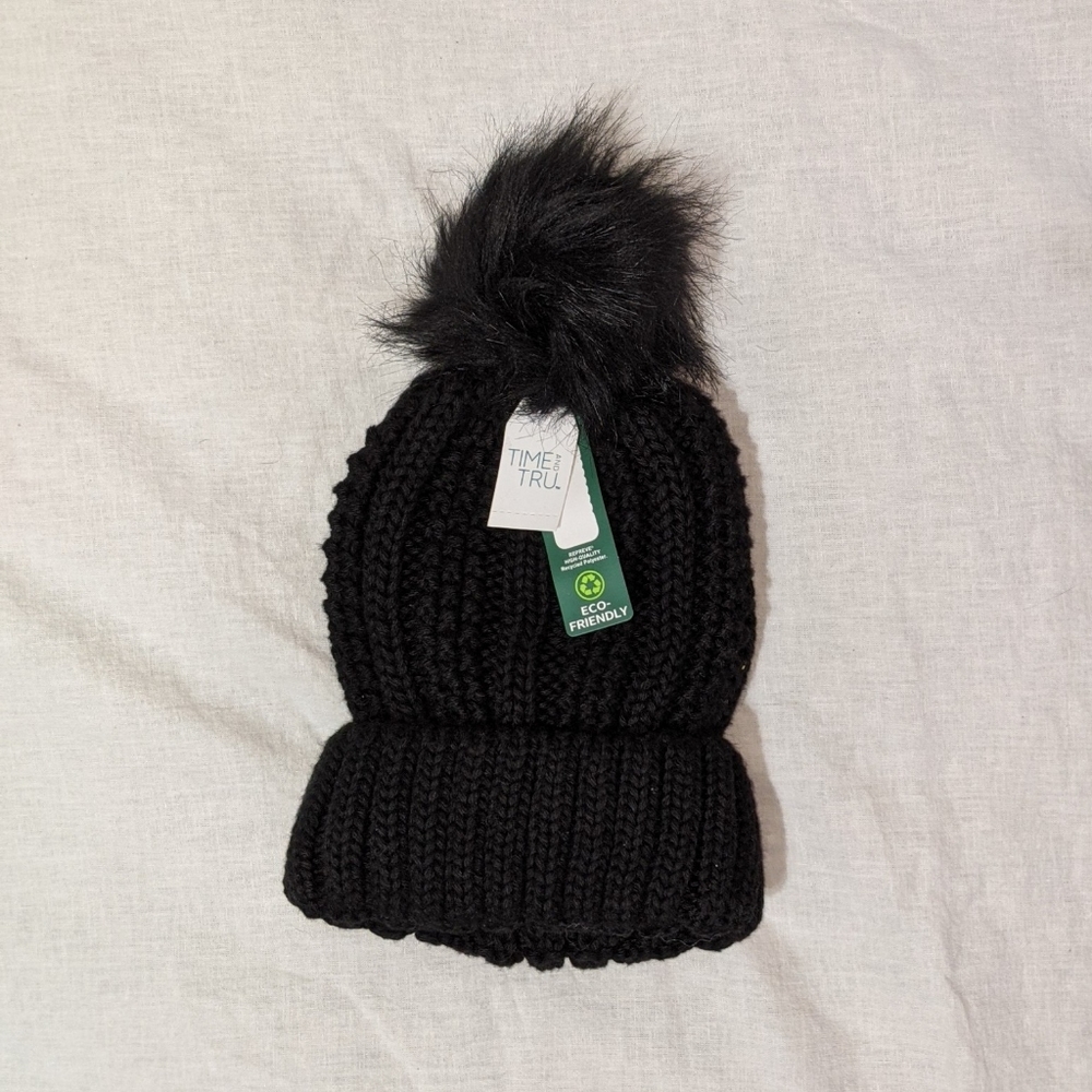 Winter knit hat with pom
